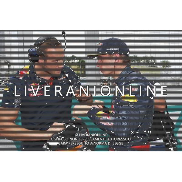 Max Verstappen (NLD) Red Bull Racing on the grid with Jake Aliker (GBR) Personal Trainer. 02.10.2016. Formula 1 World Championship, Rd 16, Malaysian Grand Prix, Sepang, Malaysia, Sunday. AG ALDO LIVERANI SAS ONLY ITALY