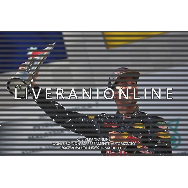 Race winner Daniel Ricciardo (AUS) Red Bull Racing celebrates on the podium. 02.10.2016. Formula 1 World Championship, Rd 16, Malaysian Grand Prix, Sepang, Malaysia, Sunday AG ALDO LIVERANI SAS ONLY ITALY