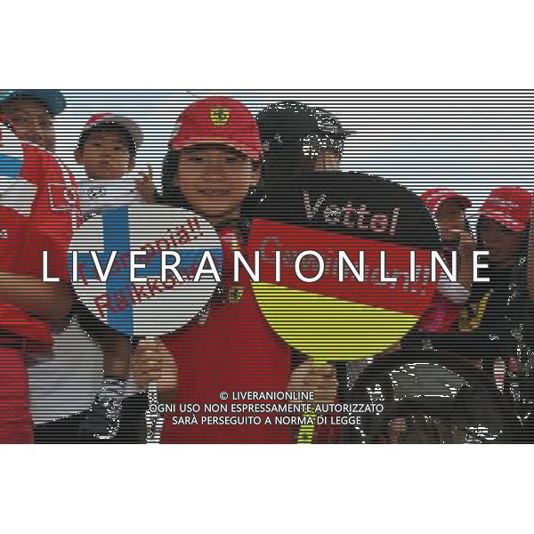 A young Ferrari fan. 06.10.2016. Formula 1 World Championship, Rd 17, Japanese Grand Prix, Suzuka, Japan, Preparation Day. AG ALDO LIVERANI SAS ONLY ITALY