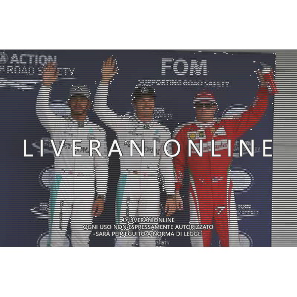 Qualifying top three in parc ferme (L to R): Lewis Hamilton (GBR) Mercedes AMG F1, second; Nico Rosberg (GER) Mercedes AMG F1, pole position; Kimi Raikkonen (FIN) Ferrari, third. Japanese Grand Prix, Saturday 8th October 2016. Suzuka, Japan. 08.10.2016. Formula 1 World Championship, Rd 17, Japanese Grand Prix, Suzuka, Japan, Qualifying Day. AG ALDO LIVERANI SAS ONLY ITALY