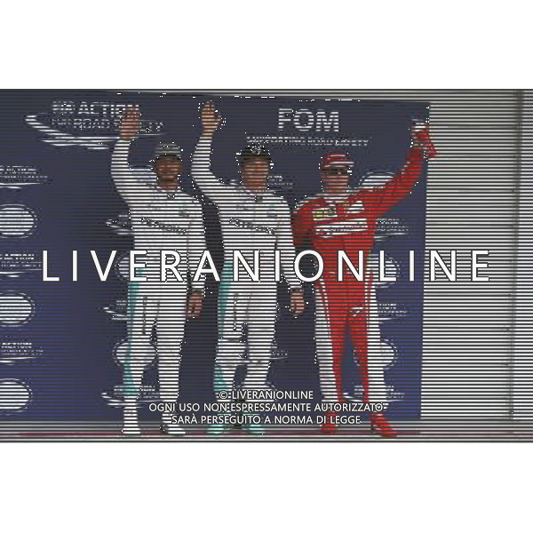 Qualifying top three in parc ferme (L to R): Lewis Hamilton (GBR) Mercedes AMG F1, second; Nico Rosberg (GER) Mercedes AMG F1, pole position; Kimi Raikkonen (FIN) Ferrari, third. Japanese Grand Prix, Saturday 8th October 2016. Suzuka, Japan. 08.10.2016. Formula 1 World Championship, Rd 17, Japanese Grand Prix, Suzuka, Japan, Qualifying Day. AG ALDO LIVERANI SAS ONLY ITALY