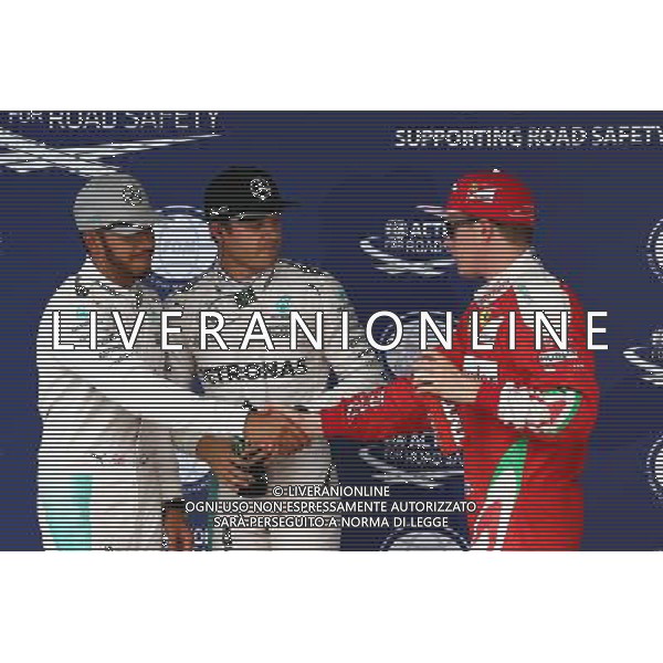 Qualifying top three in parc ferme (L to R): Lewis Hamilton (GBR) Mercedes AMG F1, second; Nico Rosberg (GER) Mercedes AMG F1, pole position; Kimi Raikkonen (FIN) Ferrari, third. 08.10.2016. Formula 1 World Championship, Rd 17, Japanese Grand Prix, Suzuka, Japan, Qualifying Day. AG ALDO LIVERANI SAS ONLY ITALY
