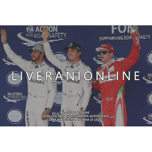 Qualifying top three in parc ferme (L to R): Lewis Hamilton (GBR) Mercedes AMG F1, second; Nico Rosberg (GER) Mercedes AMG F1, pole position; Kimi Raikkonen (FIN) Ferrari, third. 08.10.2016. Formula 1 World Championship, Rd 17, Japanese Grand Prix, Suzuka, Japan, Qualifying Day. AG ALDO LIVERANI SAS ONLY ITALY