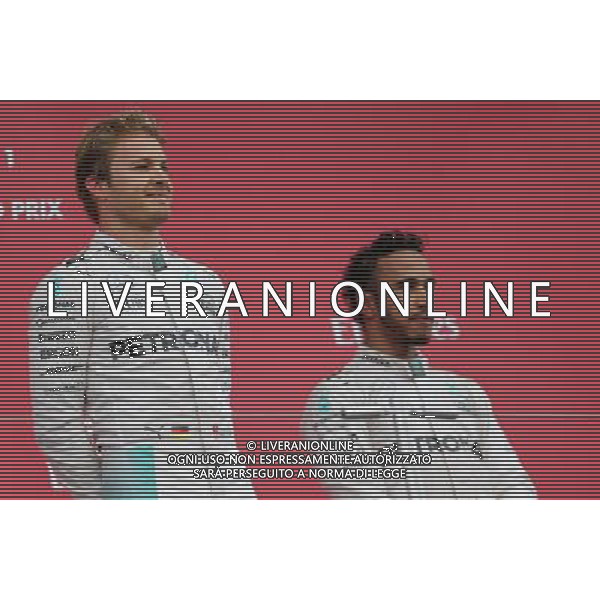 Nico Rosberg (GER), Mercedes AMG F1 Team and Lewis Hamilton (GBR), Mercedes AMG F1 Team 09.10.2016. Formula 1 World Championship, Rd 17, Japanese Grand Prix, Suzuka, Japan, Race Day. /AGENZIA ALDO LIVERANI Sas - ITALY ONLY - EDITORIAL USE ONLY