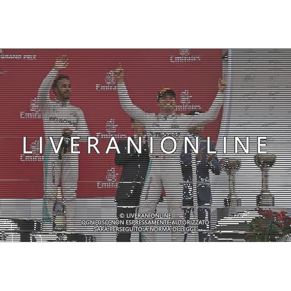 Race winner Nico Rosberg (GER) Mercedes AMG F1 (Right) celebrates on the podium with third placed team mate Lewis Hamilton (GBR) Mercedes AMG F1. 09.10.2016. Formula 1 World Championship, Rd 17, Japanese Grand Prix, Suzuka, Japan, Race Day. /AGENZIA ALDO LIVERANI Sas - ITALY ONLY - EDITORIAL USE ONLY