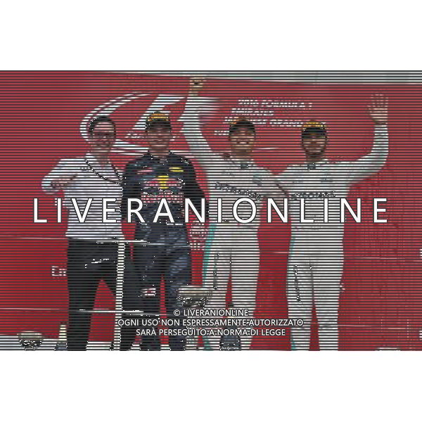 The podium (L to R): Andrew Shovlin (GBR) Mercedes AMG F1 Engineer; Max Verstappen (NLD) Red Bull Racing, second; Daniel Ricciardo (AUS) Red Bull Racing, race winner; Nico Rosberg (GER) Mercedes AMG F1, third. 09.10.2016. Formula 1 World Championship, Rd 17, Japanese Grand Prix, Suzuka, Japan, Race Day. /AGENZIA ALDO LIVERANI Sas - ITALY ONLY - EDITORIAL USE ONLY