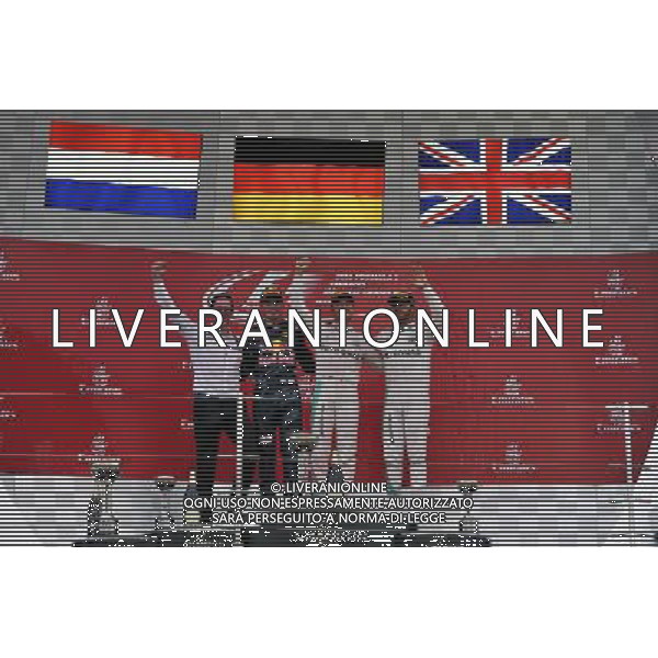 The podium (L to R): Andrew Shovlin (GBR) Mercedes AMG F1 Engineer; Max Verstappen (NLD) Red Bull Racing, second; Daniel Ricciardo (AUS) Red Bull Racing, race winner; Nico Rosberg (GER) Mercedes AMG F1, third. 09.10.2016. Formula 1 World Championship, Rd 17, Japanese Grand Prix, Suzuka, Japan, Race Day. /AGENZIA ALDO LIVERANI Sas - ITALY ONLY - EDITORIAL USE ONLY