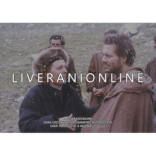 Francesco  un film del 1989 diretto da Liliana Cavani, la quale riprende a distanza di ventitrŽ ... La Cavani riprende con questo film il personaggio di Francesco che aveva giˆ affrontato nel 1966 con un interprete \'scomodo\' e fuori retorica come Lou Castel, qui sostituito da Mickey Rourke, altro attore \'maudit\'. NELLA FOTO MICKEY ROURKE CON LILIANA CAVANI AG ALDO LIVERANI SAS