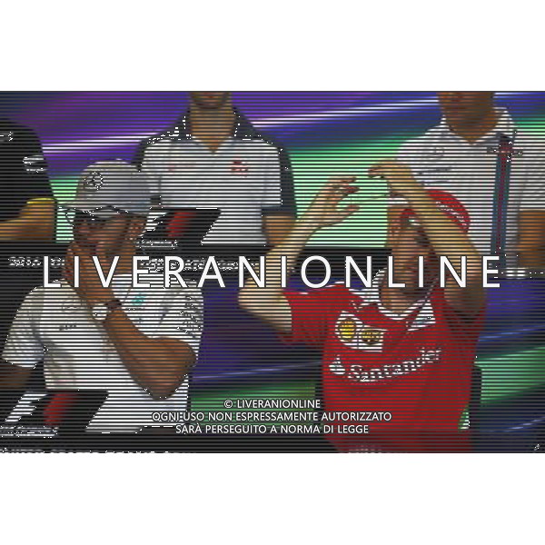 (L to R): Lewis Hamilton (GBR) Mercedes AMG F1 and Sebastian Vettel (GER) Ferrari in the FIA Press Conference. 20.10.2016. Formula 1 World Championship, Rd 18, United States Grand Prix, Austin, Texas, USA, Preparation Day. AG ALDO LIVERANI SAS ONLY ITALY
