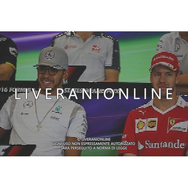 (L to R): Lewis Hamilton (GBR) Mercedes AMG F1 and Sebastian Vettel (GER) Ferrari in the FIA Press Conference. 20.10.2016. Formula 1 World Championship, Rd 18, United States Grand Prix, Austin, Texas, USA, Preparation Day. AG ALDO LIVERANI SAS ONLY ITALY