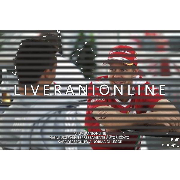 (L to R): Pascal Wehrlein (GER) Manor Racing with Sebastian Vettel (GER) Ferrari. 21.10.2016. Formula 1 World Championship, Rd 18, United States Grand Prix, Austin, Texas, USA, Practice Day. / AGENZIA ALDO LIVERANI SAS - ITALY ONLY EDITORIAL USE ONLY