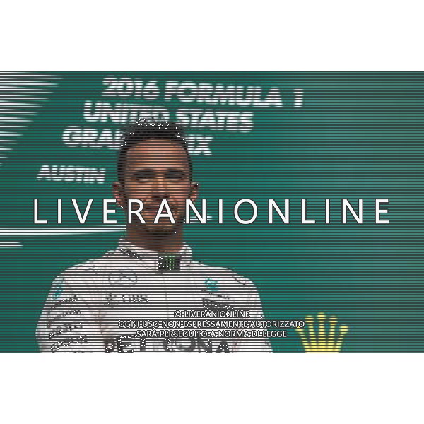 Race winner Lewis Hamilton (GBR) Mercedes AMG F1 celebrates on the podium. 23.10.2016. Formula 1 World Championship, Rd 18, United States Grand Prix, Austin, Texas, USA, Race Day. AG ALDO LIVERANI SAS ONLY ITALY
