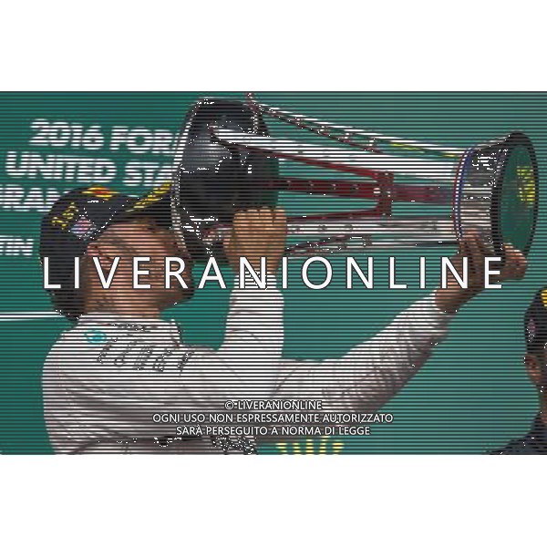 Race winner Lewis Hamilton (GBR) Mercedes AMG F1 celebrates on the podium. 23.10.2016. Formula 1 World Championship, Rd 18, United States Grand Prix, Austin, Texas, USA, Race Day. AG ALDO LIVERANI SAS ONLY ITALY