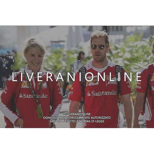 Sebastian Vettel (GER) Ferrari with Britta Roeske (AUT) Ferrari Press Officer. 27.10.2016. Formula 1 World Championship, Rd 19, Mexican Grand Prix, Mexico City, Mexico, Preparation Day. AG ALDO LIVERANI SAS ONLY ITALY