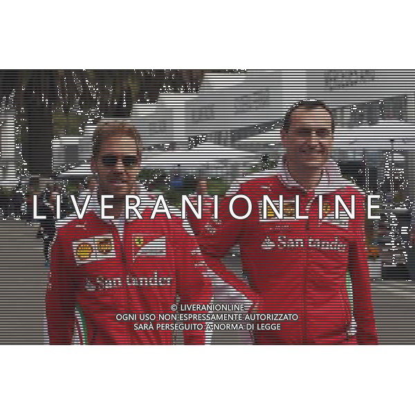 (L to R): Sebastian Vettel (GER) Ferrari with Riccardo Adami (ITA) Ferrari Race Engineer. 27.10.2016. Formula 1 World Championship, Rd 19, Mexican Grand Prix, Mexico City, Mexico, Preparation Day. AG ALDO LIVERANI SAS ONLY ITALY