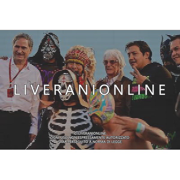 Bernie Ecclestone (GBR) with Mexican wrestlers. 27.10.2016. Formula 1 World Championship, Rd 19, Mexican Grand Prix, Mexico City, Mexico, Preparation Day. AG ALDO LIVERANI SAS ONLY ITALY
