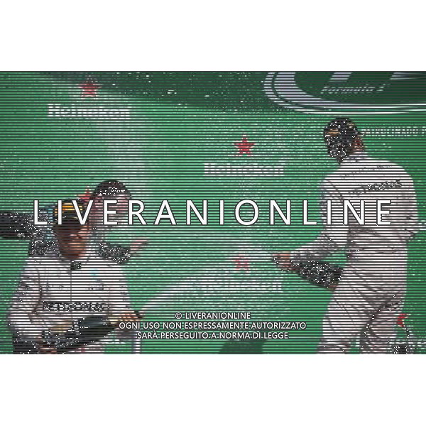 Nico Rosberg (GER) Mercedes AMG Petronas F1 W07 and Lewis Hamilton (GBR) Mercedes AMG F1 W07 . 30.10.2016. Formula 1 World Championship, Rd 19, Mexican Grand Prix, Mexico City, Mexico, Race Day. / AGENZIA ALDO LIVERANI SAS - ITALY ONLY EDITORIAL USE ONLY
