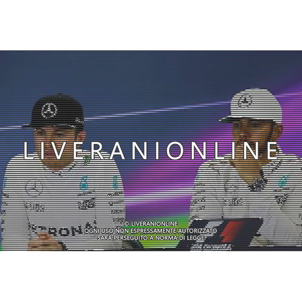 (L to R): Nico Rosberg (GER) Mercedes AMG F1 and Lewis Hamilton (GBR) Mercedes AMG F1 in the FIA Press Conference. 30.10.2016. Formula 1 World Championship, Rd 19, Mexican Grand Prix, Mexico City, Mexico, Race Day. s / AGENZIA ALDO LIVERANI SAS - ITALY ONLY EDITORIAL USE ONLY
