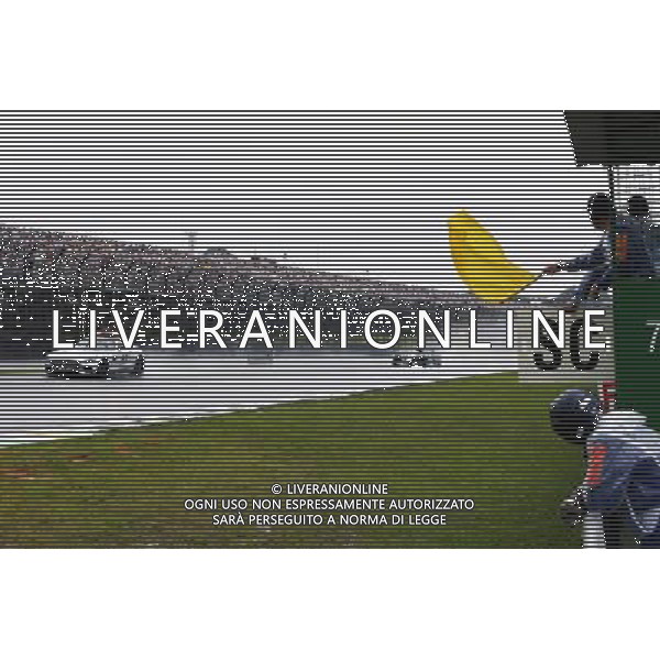 Lewis Hamilton (GBR) Mercedes AMG F1 W07 Hybrid leads behind the FIA Safety Car. 13.11.2016. Formula 1 World Championship, Rd 20, Brazilian Grand Prix, Sao Paulo, Brazil, Race Day. / AGENZIA ALDO LIVERANI SAS - ITALY ONLY EDITORIAL USE ONLY - Gp Brasile Gara