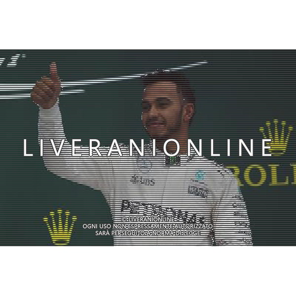 Race winner Lewis Hamilton (GBR) Mercedes AMG F1 celebrates on the podium. 13.11.2016. Formula 1 World Championship, Rd 20, Brazilian Grand Prix, Sao Paulo, Brazil, Race Day. / AGENZIA ALDO LIVERANI SAS - ITALY ONLY EDITORIAL USE ONLY - Gp F1 Brasile Gara