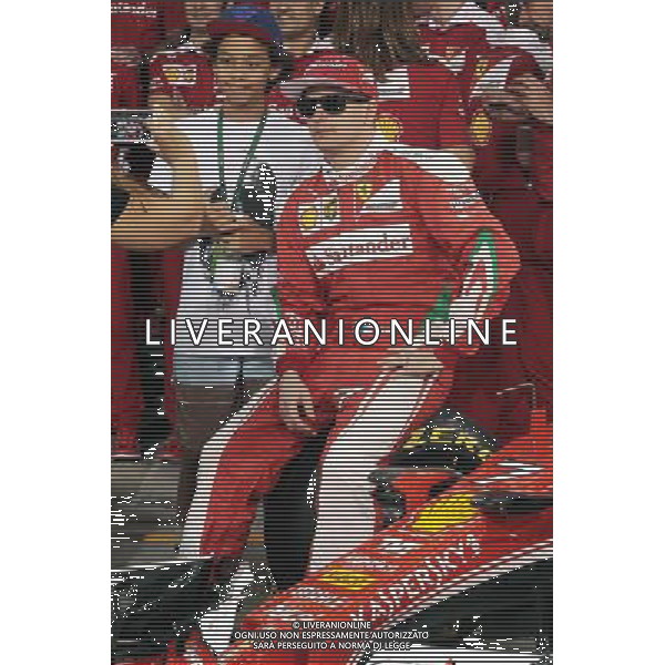 Kimi Raikkonen (FIN) Ferrari at a team photograph. 24.11.2016. Formula 1 World Championship, Rd 21, Abu Dhabi Grand Prix, Yas Marina Circuit, Abu Dhabi, Preparation Day. AG ALDO LIVERANI SAS ONLY ITALY