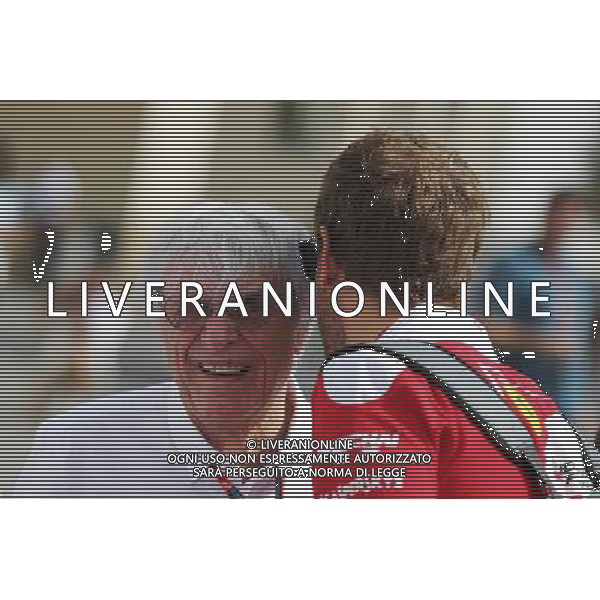 (L to R): Bernie Ecclestone (GBR) with Sebastian Vettel (GER) Ferrari. 25.11.2016. Formula 1 World Championship, Rd 21, Abu Dhabi Grand Prix, Yas Marina Circuit, Abu Dhabi, Practice Day. AG ALDO LIVERANI SAS ONLY ITALY