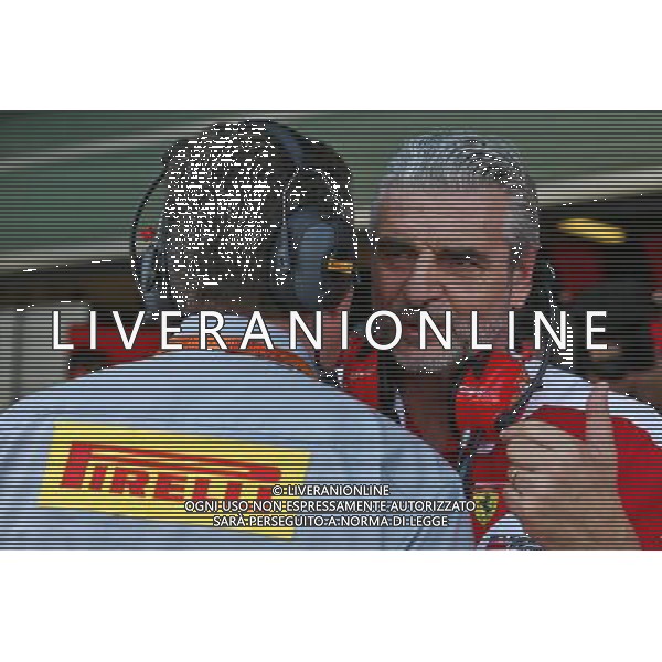 Maurizio Arrivabene (ITA) Ferrari Team Principal with Mario Isola (ITA) Pirelli Racing Manager. 25.11.2016. Formula 1 World Championship, Rd 21, Abu Dhabi Grand Prix, Yas Marina Circuit, Abu Dhabi, Practice Day. AG ALDO LIVERANI SAS ONLY ITALY