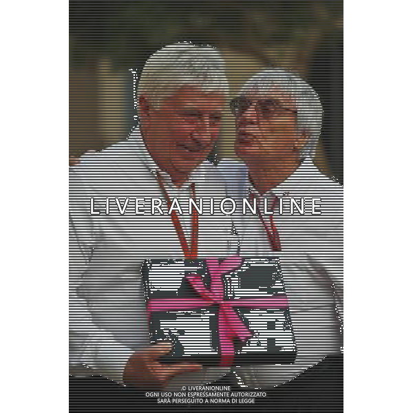 (L to R): Herbie Blash (GBR) FIA Delegate with Bernie Ecclestone (GBR). 25.11.2016. Formula 1 World Championship, Rd 21, Abu Dhabi Grand Prix, Yas Marina Circuit, Abu Dhabi, Practice Day. AG ALDO LIVERANI SAS ONLY ITALY