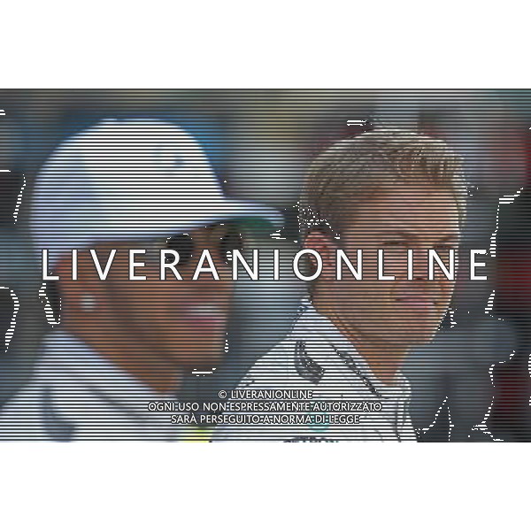Nico Rosberg (GER) Mercedes AMG F1 and Nico Rosberg (GER) Mercedes AMG F1 27.11.2016. Formula 1 World Championship, Rd 21, Abu Dhabi Grand Prix, Yas Marina Circuit, Abu Dhabi, Race Day. AG ALDO LIVERANI SAS ONLY ITALY