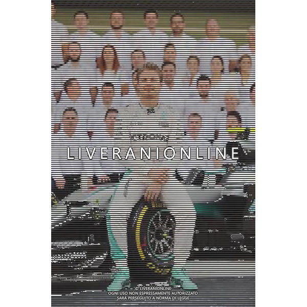 Nico Rosberg (GER) Mercedes AMG F1 at a team photograph. 27.11.2016. Formula 1 World Championship, Rd 21, Abu Dhabi Grand Prix, Yas Marina Circuit, Abu Dhabi, Race Day. AG ALDO LIVERANI SAS ONLY ITALY
