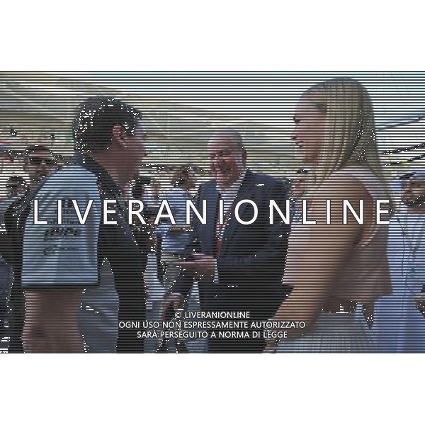 Former Spanish King Juan Carlos with Carmen Jorda (ESP) Renault Sport F1 Team Development Driver and Steve Curnow (GBR) Sahara Force India F1 Team Commercial Director. 27.11.2016. Formula 1 World Championship, Rd 21, Abu Dhabi Grand Prix, Yas Marina Circuit, Abu Dhabi, Race Day. AG ALDO LIVERANI SAS ONLY ITALY