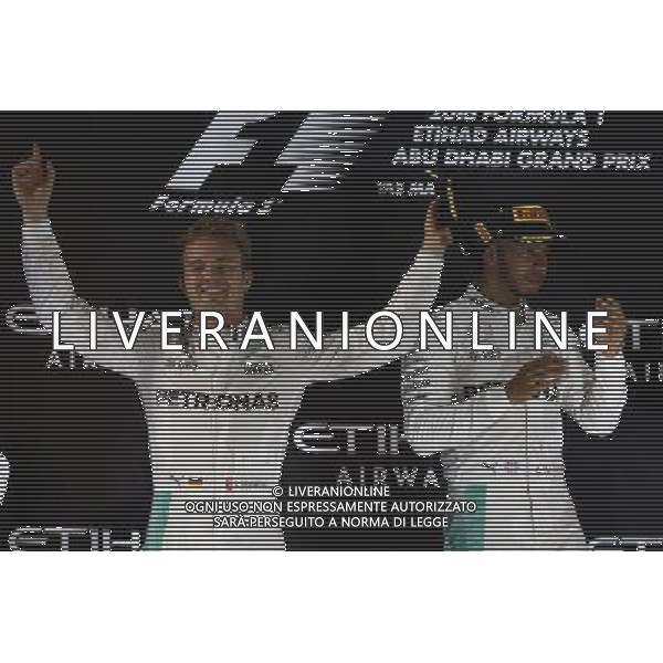 2nd place Nico Rosberg (GER) Mercedes AMG Petronas F1 W07 and 1st place Lewis Hamilton (GBR) Mercedes AMG F1 W07 . 27.11.2016. Formula 1 World Championship, Rd 21, Abu Dhabi Grand Prix, Yas Marina Circuit, Abu Dhabi, Race Day. AG ALDO LIVERANI SAS ONLY ITALY