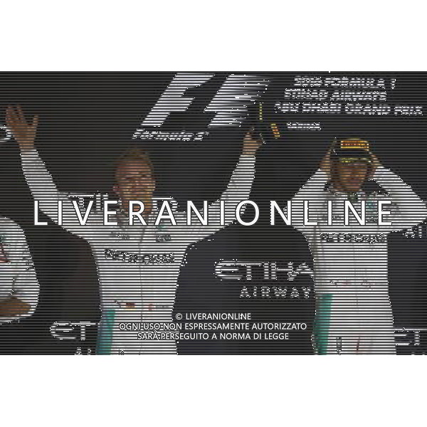 2nd place Nico Rosberg (GER) Mercedes AMG Petronas F1 W07 and 1st place Lewis Hamilton (GBR) Mercedes AMG F1 W07 . 27.11.2016. Formula 1 World Championship, Rd 21, Abu Dhabi Grand Prix, Yas Marina Circuit, Abu Dhabi, Race Day. AG ALDO LIVERANI SAS ONLY ITALY