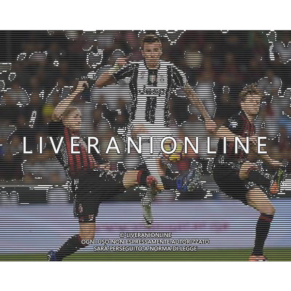 Supercoppa Italiana TIM 2016 Doha (Qatar) - 23.12.2016 Juventus-Milan Nella Foto:Mario Mandzukic fra Gabriel Paletta e Ignazio Abate /Ag. Aldo Liverani