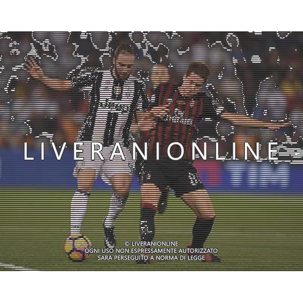 Supercoppa Italiana TIM 2016 Doha (Qatar) - 23.12.2016 Juventus-Milan Nella Foto:Gonzalo Higuain e Mario Pasalic /Ag. Aldo Liverani