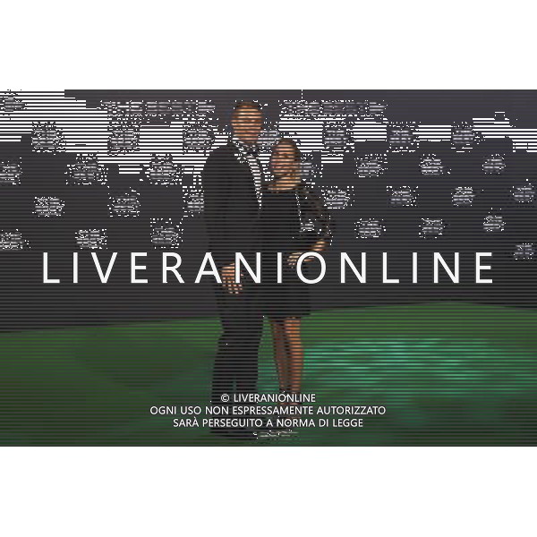 firo : FuÃŸball,Fussball : 09.01.2017 The Best FIFA Football Awards 2016 Weltfussballerwahl 2016, The Best, Manuel Neuer und Nina Weiss, ganze Figur, Gestik, Freude, roter Teppich $worldrightsEs gelten unsere AGB, einsehbar auf www.firosportphoto.de copyright by firo sportphoto: Coesfelder Str. 207 D- 48249 DÃ¼lmen www.firosportphoto.de mail@firosportphoto.de (V o l k s b a n k B o c h u m - W i t t e n ) IBAN DE68 4306 0129 0341 1171 00 Tel: +49-2594 - 9916004 Fax: +49-2594 - 9916005 / AGENZIA ALDO LIVERANI SAS - ITALY ONLY EDITORIAL USE ONLY 