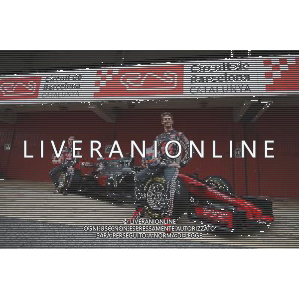 (L to R): Kevin Magnussen (DEN) Haas F1 Team and team mate Romain Grosjean (FRA) Haas F1 Team unveil the Haas VF-17. 27.02.2017. Formula One Testing, Day One, Barcelona, Spain. Monday. AG ALDO LIVERANI SAS 