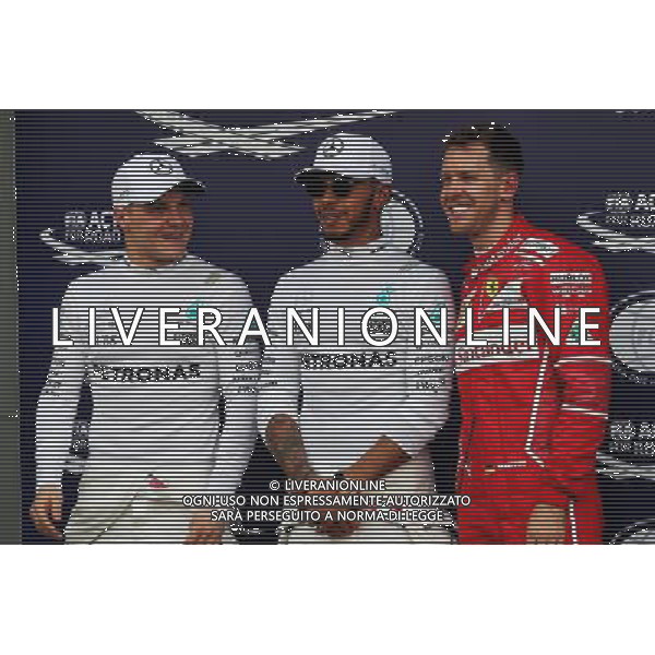 Qualifying top three in parc ferme (L to R): Valtteri Bottas (FIN) Mercedes AMG F1, third; Lewis Hamilton (GBR) Mercedes AMG F1, pole position; Sebastian Vettel (GER) Ferrari, second. 25.03.2017. Formula 1 World Championship, Rd 1, Australian Grand Prix, Albert Park, Melbourne, Australia, Qualifying Day. ONLY ITALY AG ALDO LIVERANI SAS