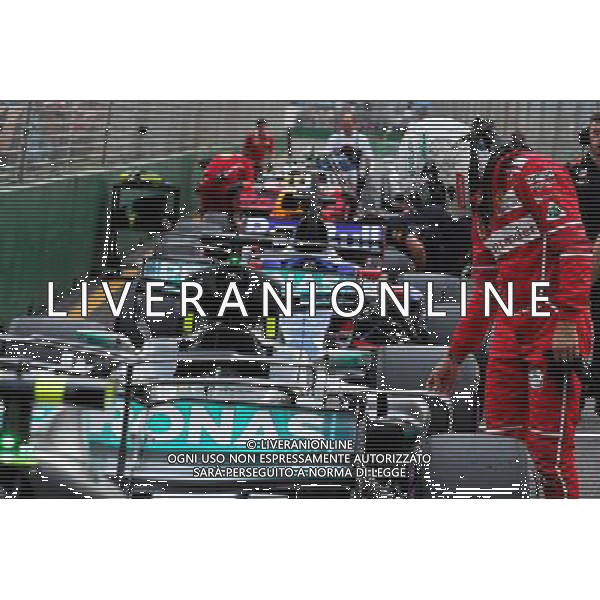 Sebastian Vettel (GER) Ferrari looks at the Mercedes AMG F1 W08 in qualifying parc ferme. 25.03.2017. Formula 1 World Championship, Rd 1, Australian Grand Prix, Albert Park, Melbourne, Australia, Qualifying Day. ONLY ITALY AG ALDO LIVERANI SAS