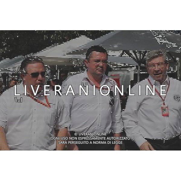 (L to R): Zak Brown (USA) McLaren Executive Director with Eric Boullier (FRA) McLaren Racing Director and Ross Brawn (GBR) Managing Director, Motor Sports. 26.03.2017. Formula 1 World Championship, Rd 1, Australian Grand Prix, Albert Park, Melbourne, Australia, Race Day. ONLY ITALY AG ALDO LIVERANI SAS