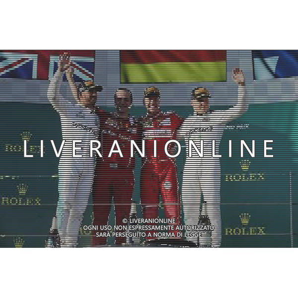 The podium (L to R): Lewis Hamilton (GBR) Mercedes AMG F1, second; Sebastian Vettel (GER) Ferrari, race winner; Valtteri Bottas (FIN) Mercedes AMG F1, third. 26.03.2017. Formula 1 World Championship, Rd 1, Australian Grand Prix, Albert Park, Melbourne, Australia, Race Day. ONLY ITALY AG ALDO LIVERANI SAS