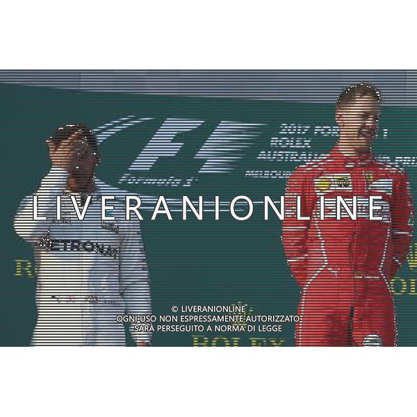 2nd place Lewis Hamilton (GBR) Mercedes AMG F1 with 1st place Sebastian Vettel (GER) Ferrari. 26.03.2017. Formula 1 World Championship, Rd 1, Australian Grand Prix, Albert Park, Melbourne, Australia, Race Day. ONLY ITALY AG ALDO LIVERANI SAS