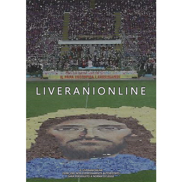 Milano ( MI ) 25/03/2017 Stadio San Siro il Papa incontra i cresimandi e cresimati Nella foto: Il volto di Gesu\' e sullo sfondo Papa Francesco PH Lauro Montagnini / AGENZIA ALDO LIVERANI SAS Visita Pastorale di sua Santita\' Papa Francesco a Milano che incontra i cresimandi allo stadio San Siro 25.03.2017