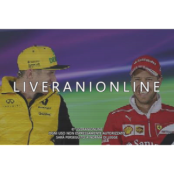 Sebastian Vettel (GER) Scuderia Ferrari and Nico Hulkenberg (GER) Renault Sport F1 Team 06.04.2017. Formula 1 World Championship, Rd 2, Chinese Grand Prix, Shanghai, China, Preparation Day. ONLY ITALY AG ALDO LIVERANI SAS