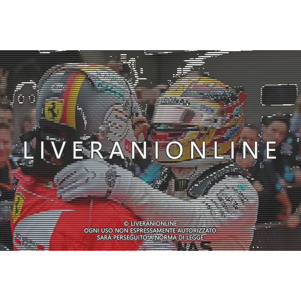 Sebastian Vettel (GER) Scuderia Ferrari and Lewis Hamilton (GBR) Mercedes AMG F1 09.04.2017. Formula 1 World Championship, Rd 2, Chinese Grand Prix, Shanghai, China, Race Day. ONLY ITALY AG ALDO LIVERANI SAS