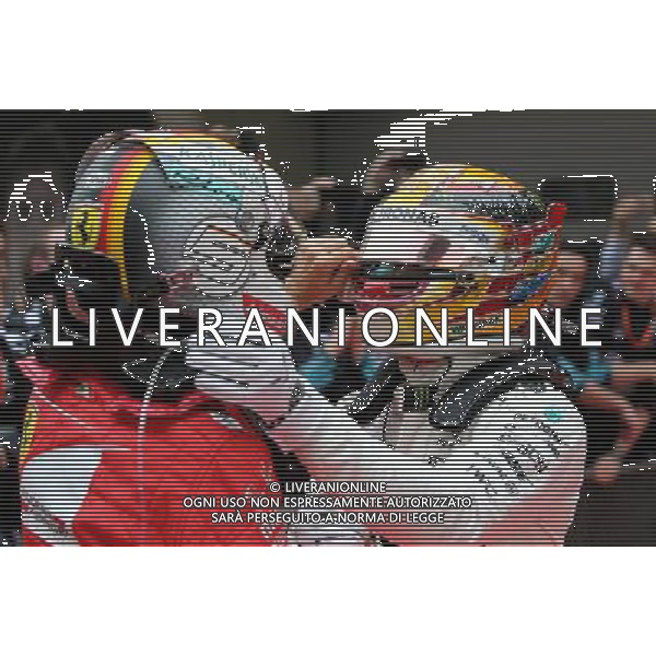 Sebastian Vettel (GER) Scuderia Ferrari and Lewis Hamilton (GBR) Mercedes AMG F1 09.04.2017. Formula 1 World Championship, Rd 2, Chinese Grand Prix, Shanghai, China, Race Day. ONLY ITALY AG ALDO LIVERANI SAS