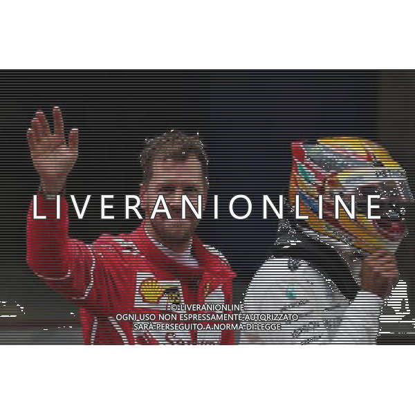 Sebastian Vettel (GER) Ferrari celebrates his second position on the podium. 09.04.2017. Formula 1 World Championship, Rd 2, Chinese Grand Prix, Shanghai, China, Race Day. ONLY ITALY AG ALDO LIVERANI SAS
