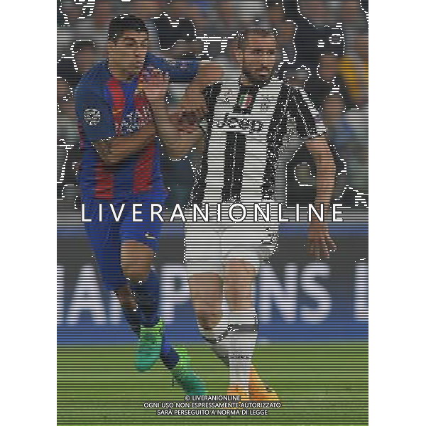 UEFA Champions League 2016/2017 Quarti di Finale Andata Torino - 11.04.2017 Juventus-Barcellona Nella Foto: luis suarez e giorgio chiellini /Ph.Vitez-Ag. Aldo Liverani