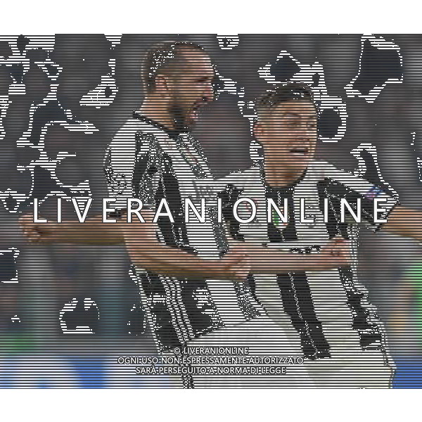 UEFA Champions League 2016/2017 Quarti di Finale Andata Torino - 11.04.2017 Juventus-Barcellona Nella Foto: esultanza dopo il gol di giorgio chiellini del 3-0 con paulo dybala /Ph.Vitez-Ag. Aldo Liverani