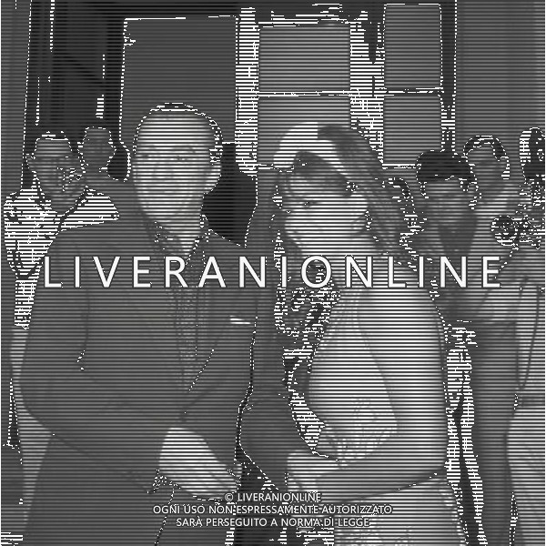 Claudia Cardinale alla Mostra del Cinema di Venezia nel 1965 - Retrospettiva nella foto con il regista Luchino Visconti ©ARCHIVIO / AGENZIA ALDO LIVERANI SAS